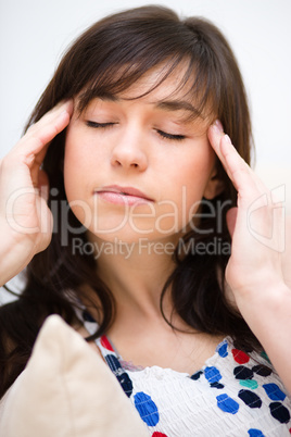 Woman is suffering headache