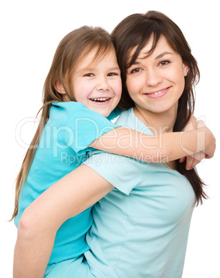 Portrait of a happy mother with her daughter