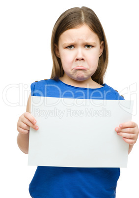 Little girl is holding blank banner