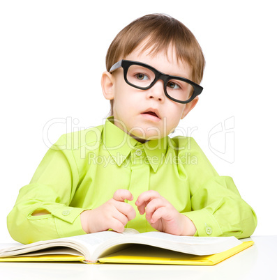 Little child play with book Little child play with book