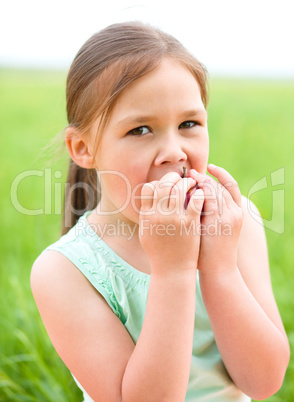 Portrait of a little girl with apple
