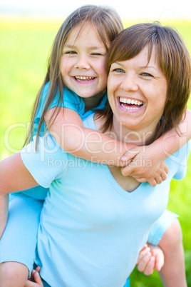 Portrait of a happy mother with her daughter