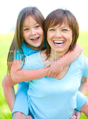 Portrait of a happy mother with her daughter