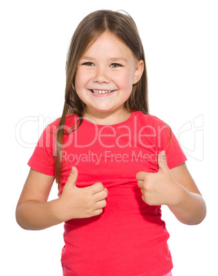 Little girl is showing thumb up gesture