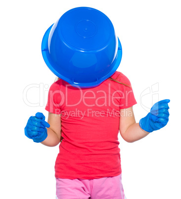 Little girl put a blue bucket on her head