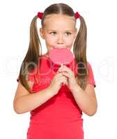 Little girl with lollipop