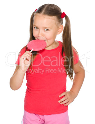 Little girl with lollipop