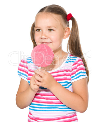 Little girl with lollipop