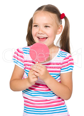 Little girl with lollipop