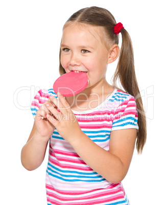 Little girl with lollipop