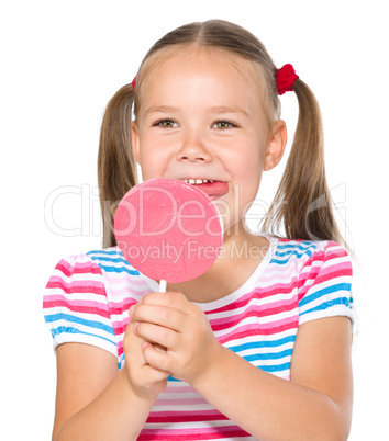 Little girl with lollipop