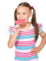 Little girl with lollipop