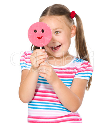 Little girl with lollipop