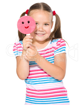 Little girl with lollipop