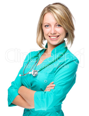 Portrait of a woman wearing doctor uniform