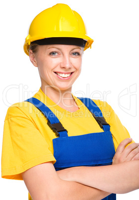 Young happy lady as a construction worker