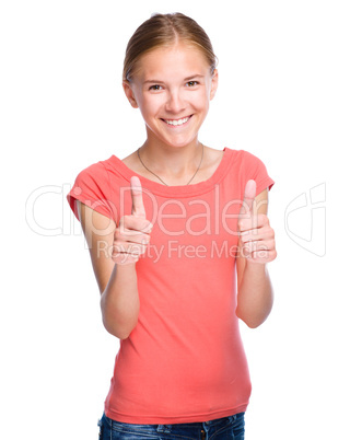 Young girl is showing thumb up gesture