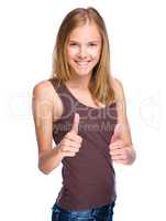 Young girl is showing thumb up gesture
