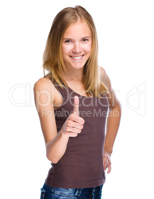 Woman is showing thumb up gesture