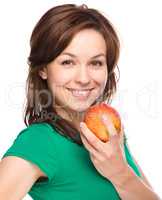 Young happy girl with apple