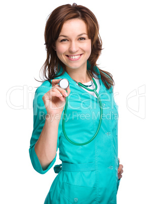 Portrait of a woman wearing doctor uniform