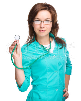 Portrait of a woman wearing doctor uniform