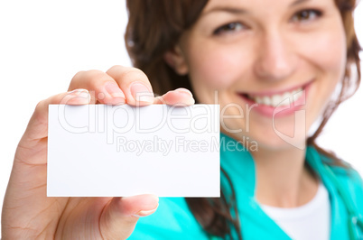 Doctor is showing her business card