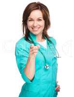Portrait of a woman wearing doctor uniform
