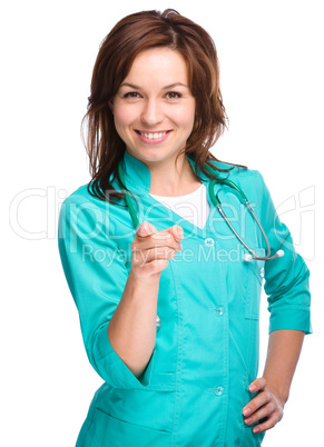 Portrait of a woman wearing doctor uniform