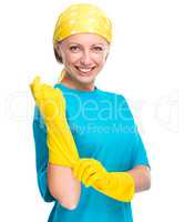 Young woman as a cleaning maid