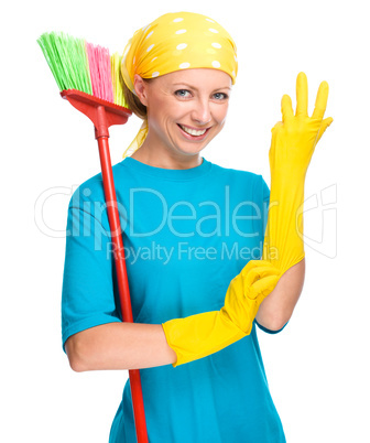 Young woman as a cleaning maid