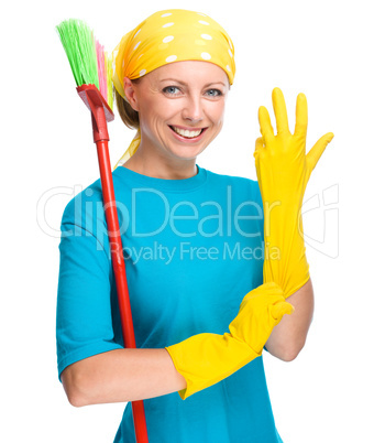 Young woman as a cleaning maid