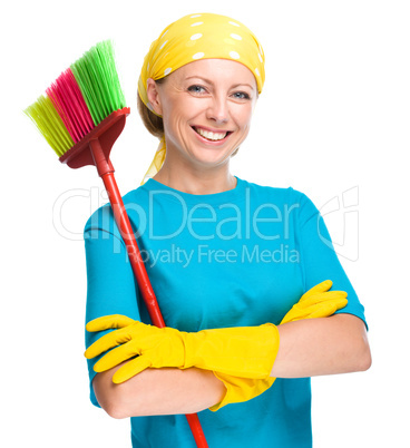 Young woman as a cleaning maid