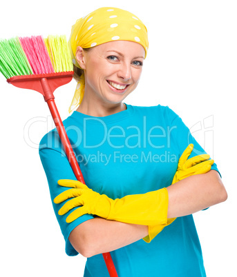 Young woman as a cleaning maid