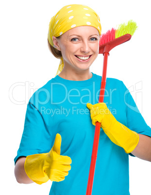 Young woman as a cleaning maid