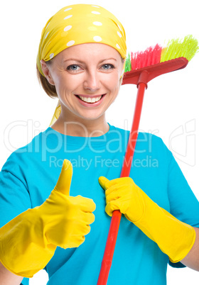 Young woman as a cleaning maid