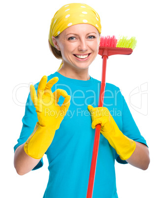 Young woman as a cleaning maid