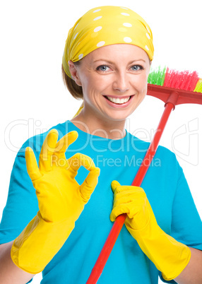 Young woman as a cleaning maid