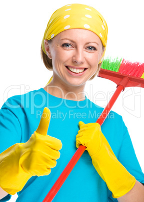 Young woman as a cleaning maid