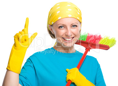 Young woman as a cleaning maid