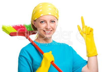 Young woman as a cleaning maid