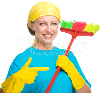 Young woman as a cleaning maid