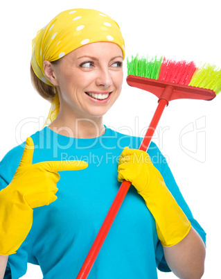 Young woman as a cleaning maid