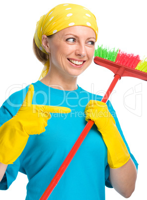 Young woman as a cleaning maid