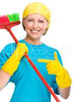 Young woman as a cleaning maid