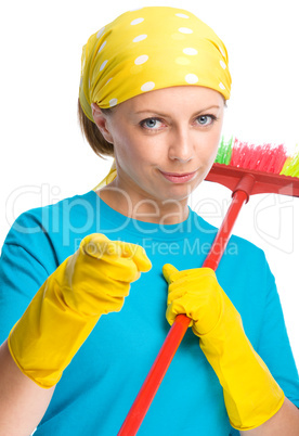 Young woman as a cleaning maid