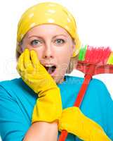 Young woman as a cleaning maid