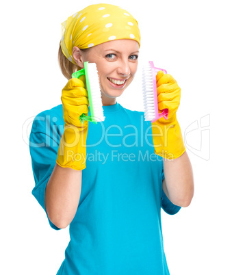 Young woman as a cleaning maid