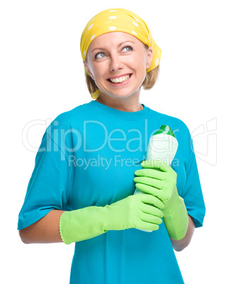 Young woman with cleaning liquid