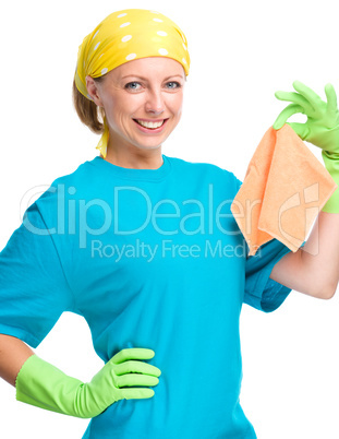 Young woman holding cleaning rag